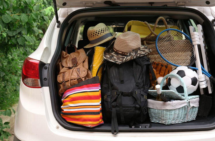 boot packed full with travel bags